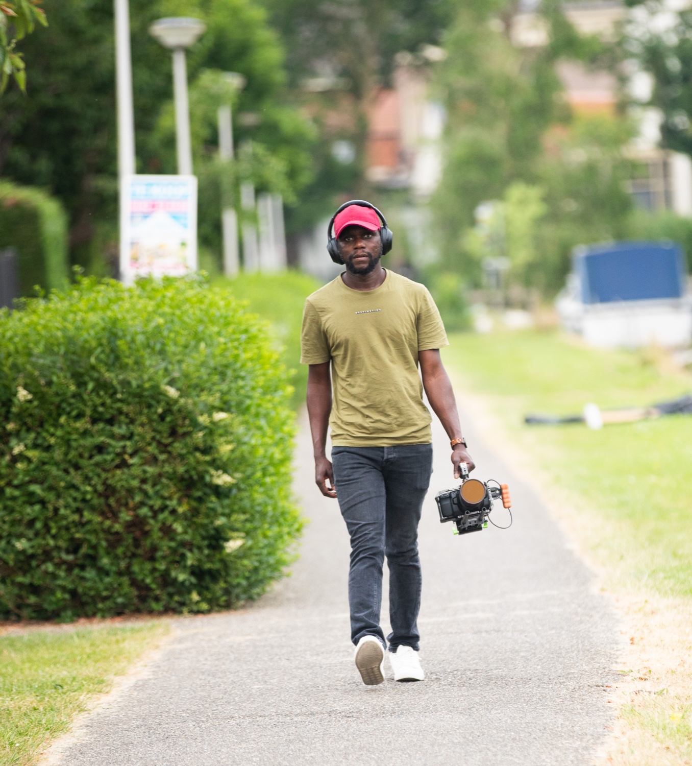 Steven Ngule on location with a cinema camera